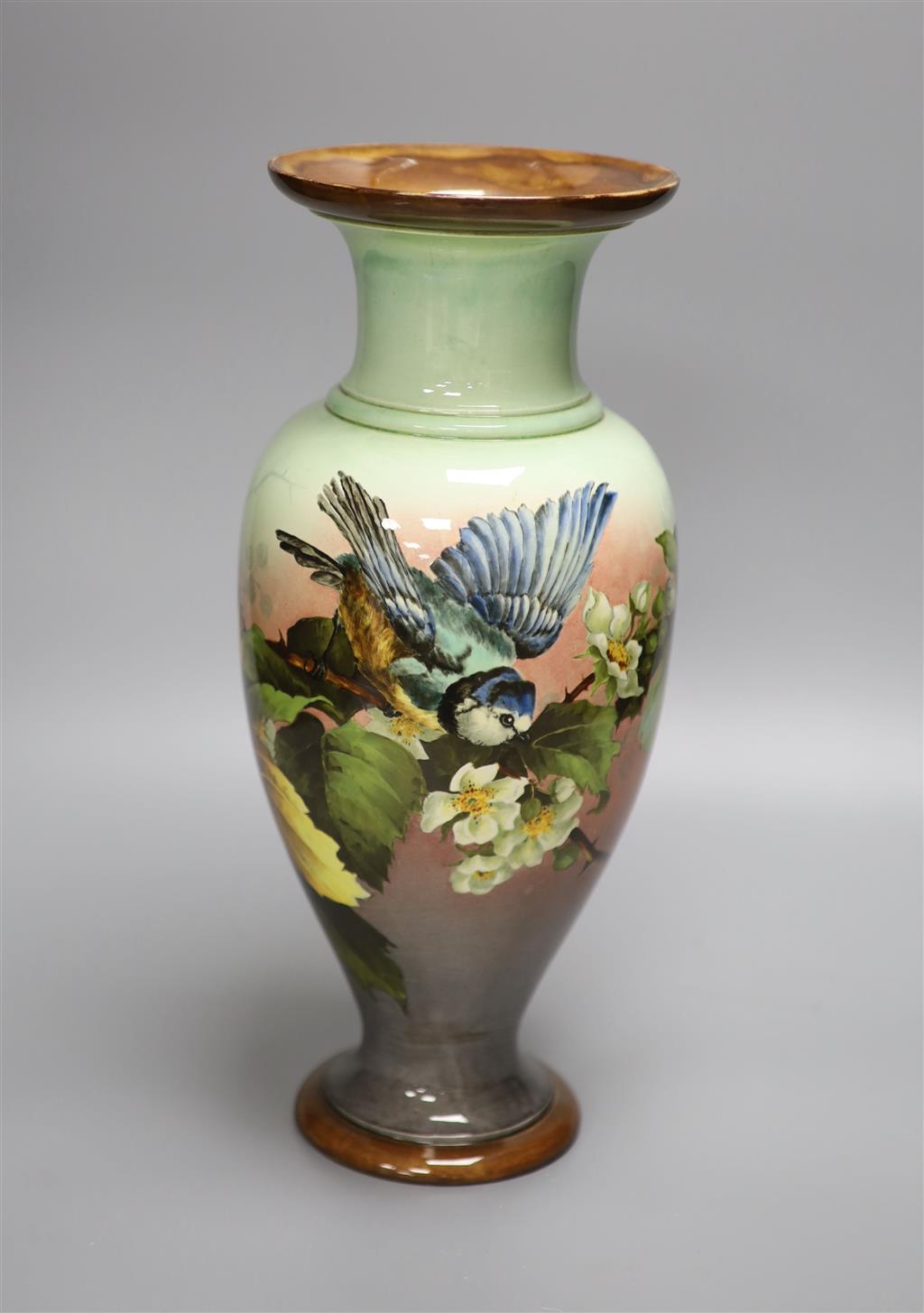 A Doulton Lambeth faience flower painted vase, 34.5cm